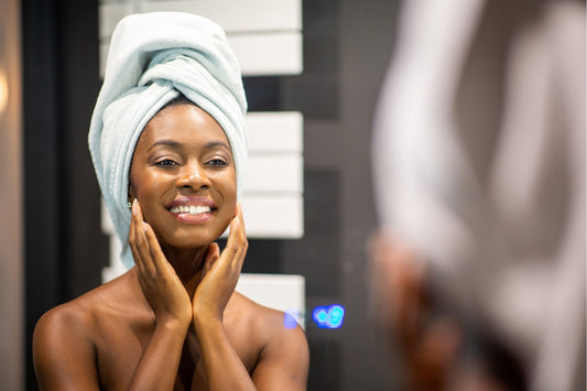 Woman smiling in mirror confidence boost